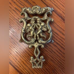 Vintage Gold Cherubs Cupids Scrolls Footed Trivet Cast Iron 8" L X 4.5" W
